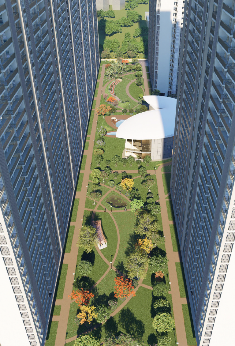 Aerial view of Forbes Fab Luxe Residences central landscaped corridor between luxury towers in Greater Noida West